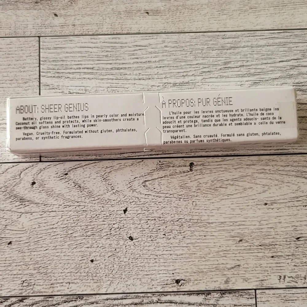 About Face Light Lock Lip Gloss in Angel on Fire